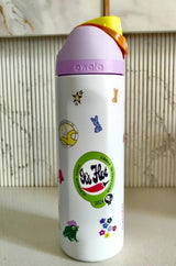 Owala FreeSip Sticker Edition - front view marble background