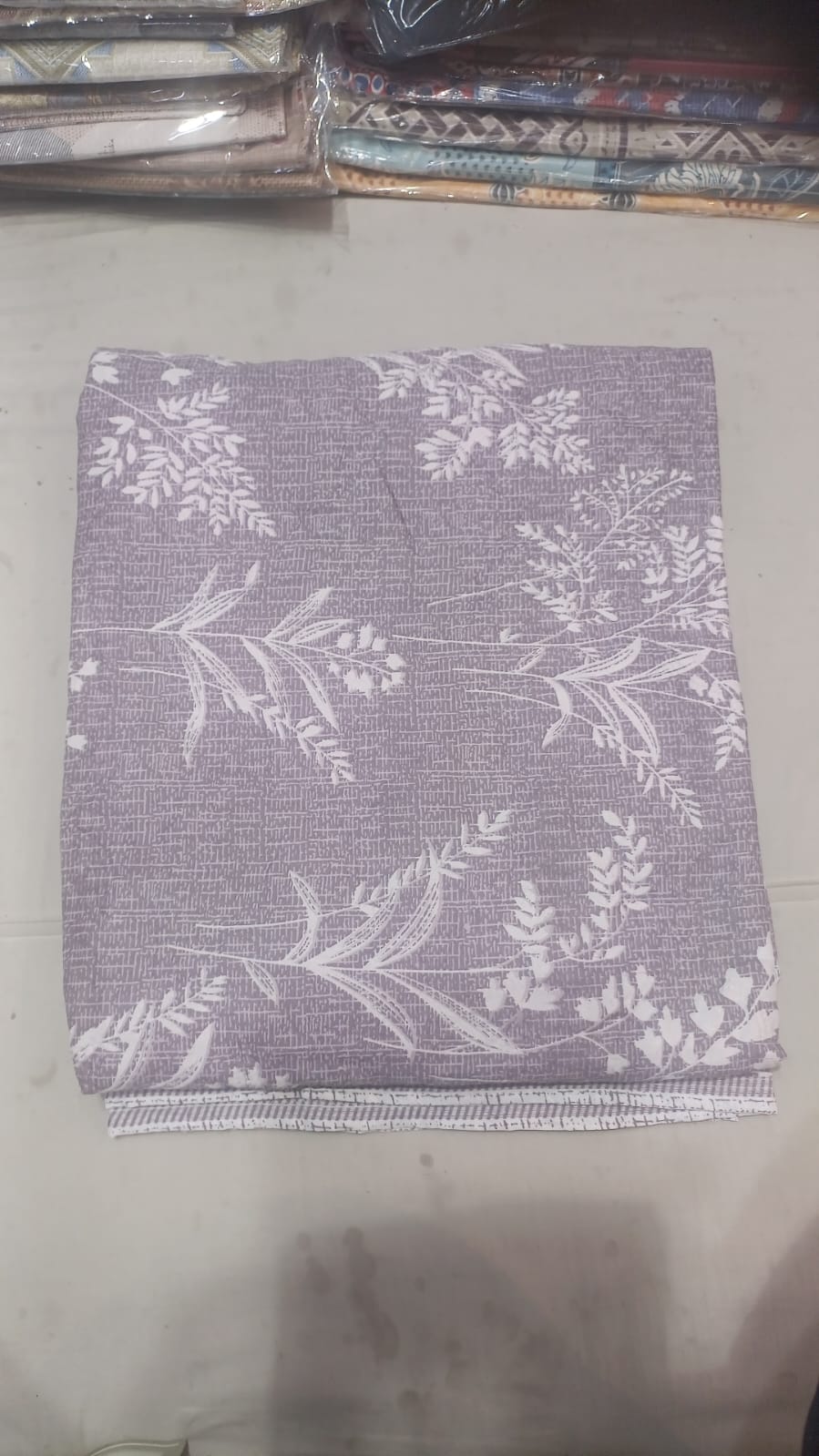 Lavender botanical comforter with white leaf print
