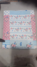 Floral striped bedsheet with pink polka dot border