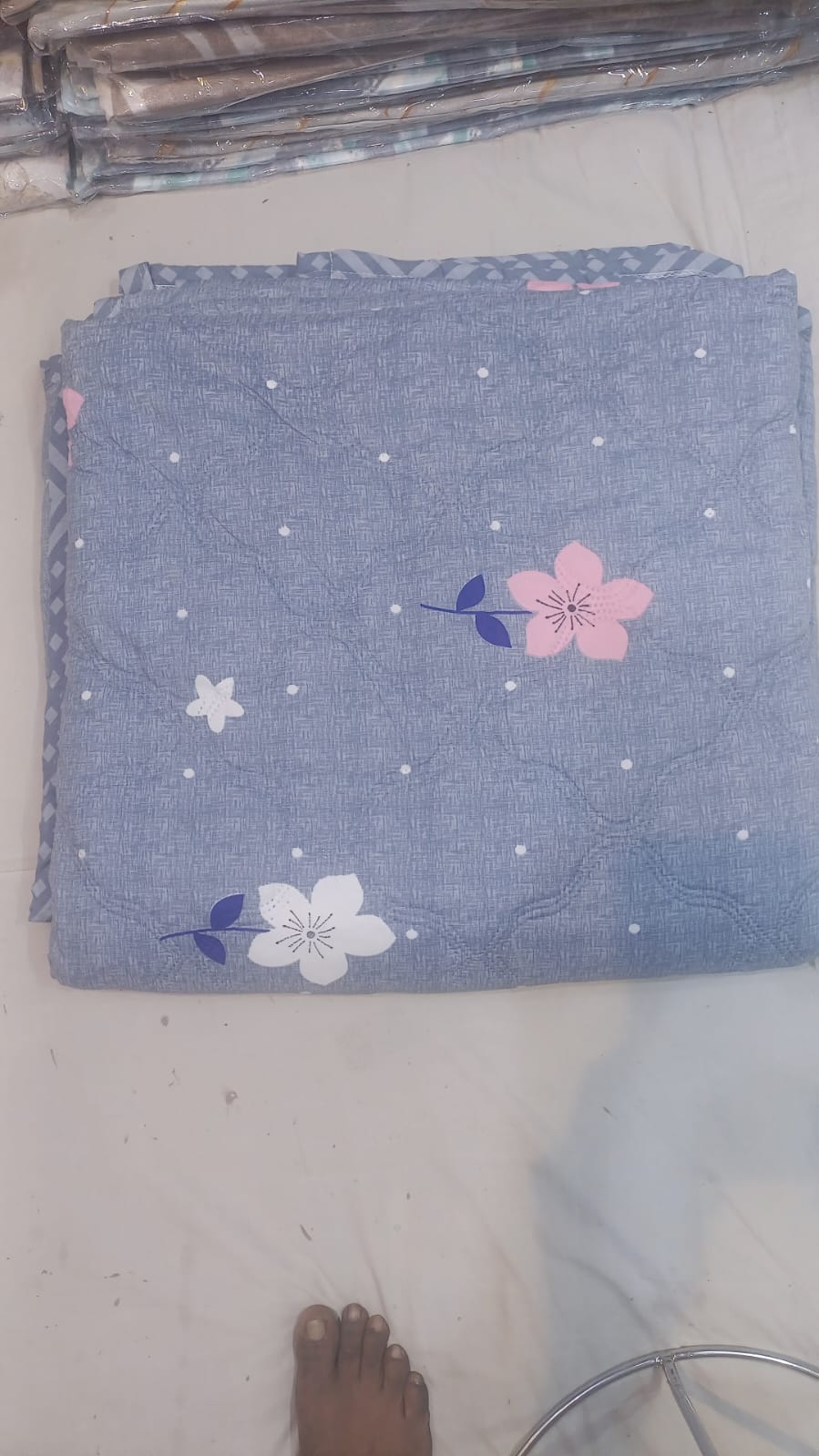 Blue floral comforter with cherry blossom print