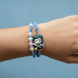 Blue K-Pop Demon Hunters bracelet worn on wrist