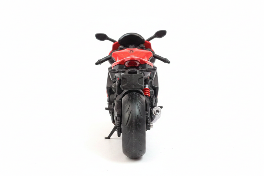 Die-cast motorcycle rear view white background