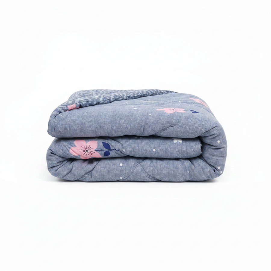 Blue floral comforter studio shot