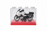 White black RACE sport tourer motorcycle in display box white background