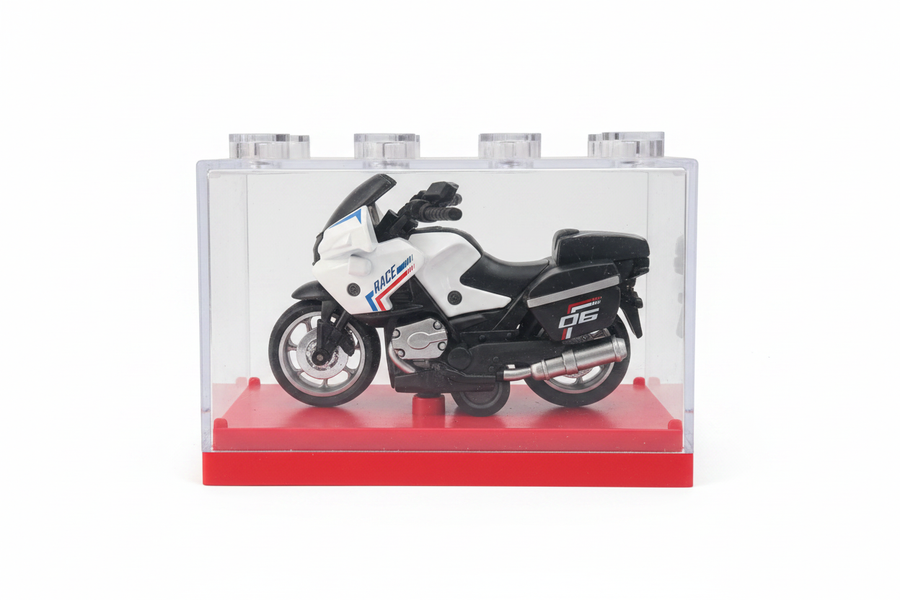 White black RACE sport tourer motorcycle in display box white background