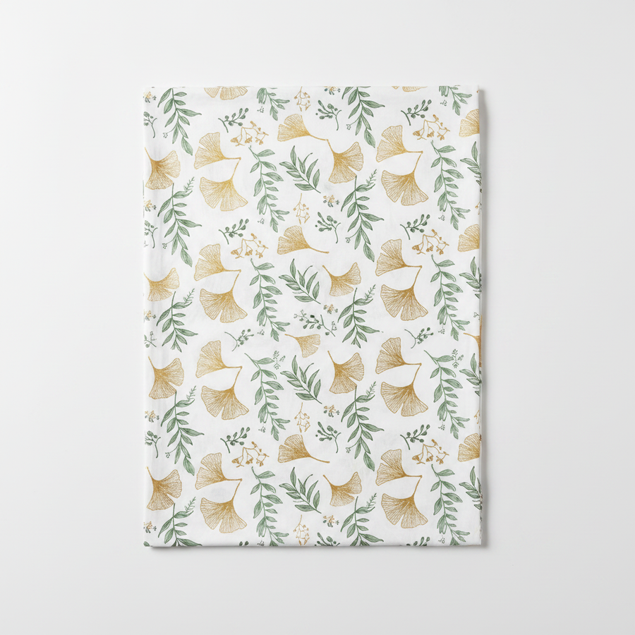 Botanical ginkgo bedsheet flat lay